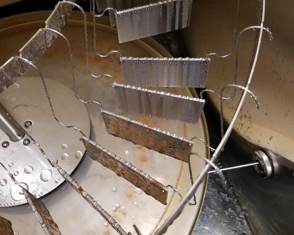 rust remover on metal pieces