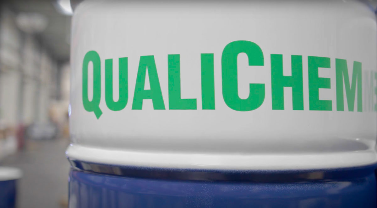 Qualichem logo on a chemical drum